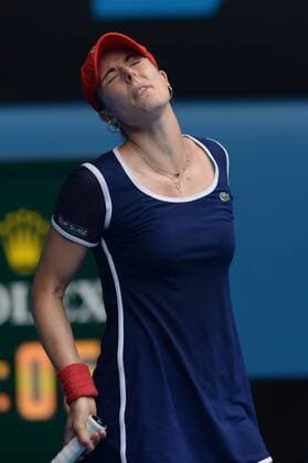Alize Cornet of France reacts during the women s singles 3rd round match at 2014 Australian Open tennis tournament in Melbourne, Australia, Jan. Jan. 18, 2014. (Xinhua Li Jundong) (SP)AUSTRALIA-MELBOURNE-TENNIS-AUSTRALIAN OPEN 