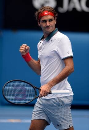 Roger Federer of Switzerland celebrates for victory after the men s singles 3rd round match at 2014 Australian Open tennis tournament in Melbourne, Australia, Jan. Jan. 18, 2014. (Xinhua Li Jundong) (SP)AUSTRALIA-MELBOURNE-TENNIS-AUSTRALIAN OPEN 