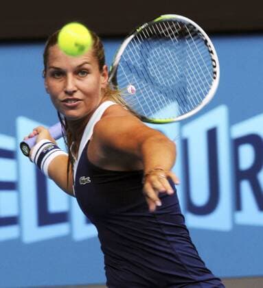(140120) -- MELBOURNE, Jan. 20, 2014 (Xinhua) -- Dominika Cibulkova of Slovakia hits a return during her women s singles fourth round match at Australian Open tennis tournament in Melbourne, Australia, Jan. 20, 2014. . (Xinhua Jin Linpeng) (SP)AUSTRALIA-MELBOURNE-TENNIS 