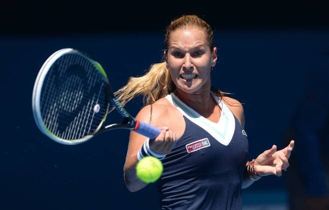(140122) -- MELBOURNE, Jan. 22, 2014 (Xinhua) -- Dominika Cibulkova of Slovakia hits a return during her women s singles quarterfinal at 2014 Australian Open tennis tournament in Melbourne, Australia, Jan. 22, 2014. (Xinhua Li Jundong) (SP)AUSTRALIA-MELBOURNE-TENNIS-CIBULKOVA-HALEP 