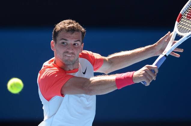 (140122) -- MELBOURNE, Jan. 22, 2014 (Xinhua) -- Grigor Dimitrov of Bulgaria hits a return during the men s singles quarterfinal at 2014 Australian Open tennis tournament in Melbourne, Australia, Jan. 22, 2014. (Xinhua Li Jundong) (SP) AUSTRALIA-MELBOURNE-TENNIS-NADAL VS DIMITROV 