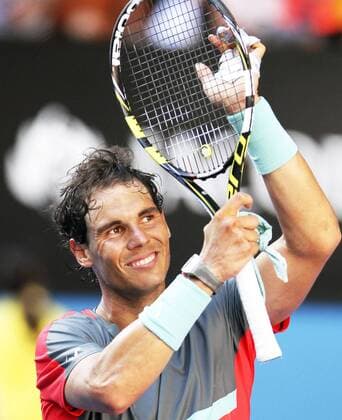 (140122) -- MELBOURNE, Jan. 22, 2014 (Xinhua) -- Rafael Nadal of Spain celebrates after winning the men s singles quarterfinal match at 2014 Australian Open tennis tournament in Melbourne, Australia, Jan. 22, 2014. Nadal won 3-1. (Xinhua Jin Linpeng) (SP) AUSTRALIA-MELBOURNE-TENNIS-NADAL VS DIMITROV 