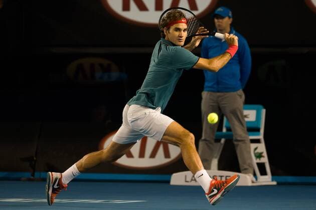 Jan. 22, 2014 - Melbourne, Victoria, Australia - January 22, 2014: 6th seed Roger FEDERER (SUI) in action against 4th seed Andy MURRAY (GBR) in a Quarterfinals match on day 10 of the 2014 Australian Open grand slam tennis tournament at Melbourne Park in Melbourne, Australia. Sydney Low Cal Media Tennis 2014: Australian Open JAN 22 - ZUMAc04
