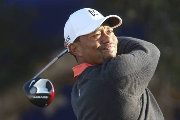 Jan. 22, 2014 - La Jolla, California, U.S. - TIGER WOODS drives the ball from the South Course 7th tee during the Pro-Am day of the Farmers Insurance Open at Torrey Pines Golf Course. Golf 2014 - Farmers Insurance Open - Pro-Am - ZUMAs44