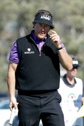Jan. 23, 2014 - La Jolla, California, U.S - Phil Mickelson waves to the crowd after putting the second green during the first round of the Farmers Insurance Open golf tournament at Torrey Pines Municipal Golf Course. Farmers Insurance Open - Round 1 - ZUMAw10