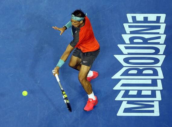 (140124) -- MELBOURNE, Jan. 24, 2014 (Xinhua) -- Rafael Nadal of Spain hits , return during his men s singles semifinal match at 2014 Australian Open tennis tournament in Melbourne, Australia, Jan. 24, 2014. Nadal won 3-0. (Xinhua Xu Yanyan) (SP)AUSTRALIA-MELBOURNE-TENNIS-NADAL 