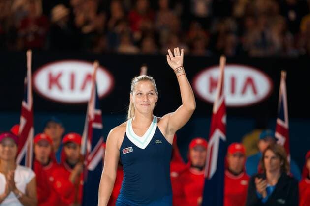 Jan. 25, 2014 - Melbourne, Victoria, Australia - January 25, 2014: 20th seed Dominika CIBULKOVA (SVK) accepts the runner up trophy at the 2014 Australian Open on day 13 at Melbourne Park in Melbourne, Australia. Sydney Tennis 2014: Australian Open JAN 25 - ZUMAc04