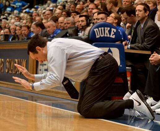 Jan. 25, 2014 - Durham, NC, USA - Duke head coach Mike Krzyzewski slaps the floor in frustration during the second half against Florida State at Cameron Indoor Stadium in Durham, N.C., Saturday, Jan. 25, 2014. Duke defeated FSU, 78-56. NCAA College League USA Basketball: Florida State v Duke - ZUMAm67