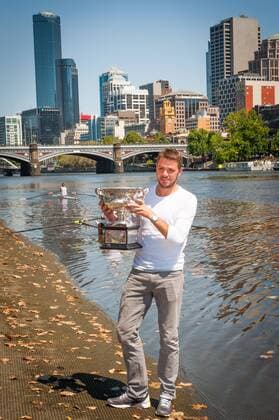 Jan. 27, 2014 - Melbourne, Victoria, Australia - Stanislaus Wawrinka of Switzerland - winner of the 2014 Australian Open Men s Singles, walks along Melbourne s Yarra River with his championship trophy during a morning photo op. Tennis 2014 - Australian Open - Wawrinka  - ZUMA Au