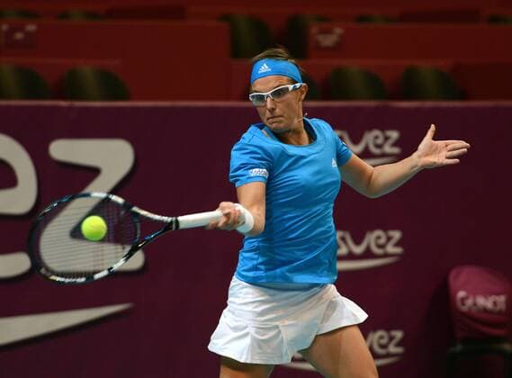 Kirsten Flipkens (BEL) in Aktion. Open GDF Suez, 2014, Paris, Frankreich.