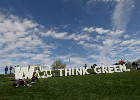 February 02, 2014: The WM Think Green sign during the 2014 Waste Management Phoenix Open at the TPC Stadium golf course in Scottsdale Arizona. . GOLF: FEB 02 PGA Golf Herren - Waste Management Phoenix Open - Final Round Icon20172896 EDITORIAL USE ONLY