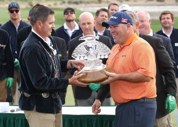 February 02, 2014: Kevin Stadler (Denver, CO) wins the WM Open and is presented the trophy during the 2014 Waste Management Phoenix Open at the TPC Stadium golf course in Scottsdale Arizona. . GOLF: FEB 02 PGA Golf Herren - Waste Management Phoenix Open - Final Round Icon20172899 EDITORIAL USE ONLY