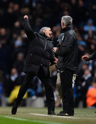 Jose Mourinho manager of Chelsea punches the air on the final whistle - Barclays Premier League - Manchester City vs Chelsea - Etihad Stadium - Manchester - England - 03rd February 2014 - Picture Simon Bellis Sportimage EDITORIAL USE ONLY. No use with unauthorised audio, video, data, fixture lists, club league logos or live services. Online in-match use limited to 120 images, no video emulation. No use in betting, games or single club league player publications.