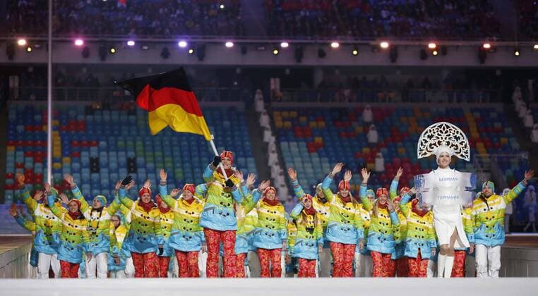 (140207) -- SOCHI, Feb. 7, 2014 (Xinhua) -- Members of Germany delegation parade into the stadium during the opening ceremony for the 22nd Winter Olympic Games in Sochi, Russia, Feb. 7, 2014. (Xinhua Wang Lili) (SP)OLY-RUSSIA-SOCHI-OPENING CEREMONY 