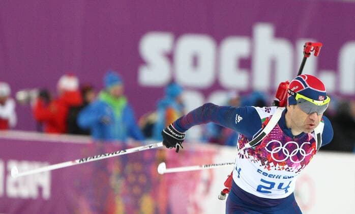 ITAR-TASS: SOCHI, RUSSIA. FEBRUARY 8, 2014. Biathlete Ole Einar Bjoerndalen of Norway competes to win the men s 10 km sprint at the Sochi 2014 Winter Olympics, at Laura biathlon & ski complex.  premiumd RE138615