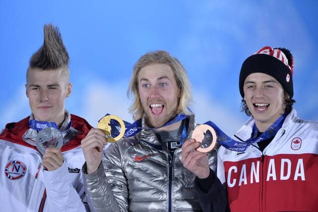 Silver-medalist Staale Sandbech (L-R) of Norway, gold-medalist Sage Kotsenburg of the the United States and bronze medalist Mark McMorris of Canada celebrate during their Victory Ceremony for the Men s Slopestyle at the Sochi 2014 Winter Olympics on February 8, 2014 in Sochi, Russia.  OLY20140208133