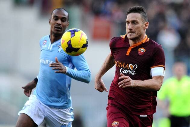Francesco Totti Roma, Abdoulay Konko Lazio. Roma 09-02-2014 Stadio Olimpico. Football Calcio 2013 2014 Serie A. Lazio Rom vs AS Roma AntoniettaxBaldassarre