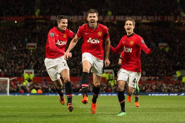 Michael Carrick of Manchester United celebrates his sides second goal - Manchester United vs. Fulham - Barclays Premier League - Old Trafford - Manchester - 09 02 2014 Pic Philip Oldham Sportimage EDITORIAL USE ONLY. No use with unauthorised audio, video, data, fixture lists, club league logos or live services. Online in-match use limited to 120 images, no video emulation. No use in betting, games or single club league player publications.
