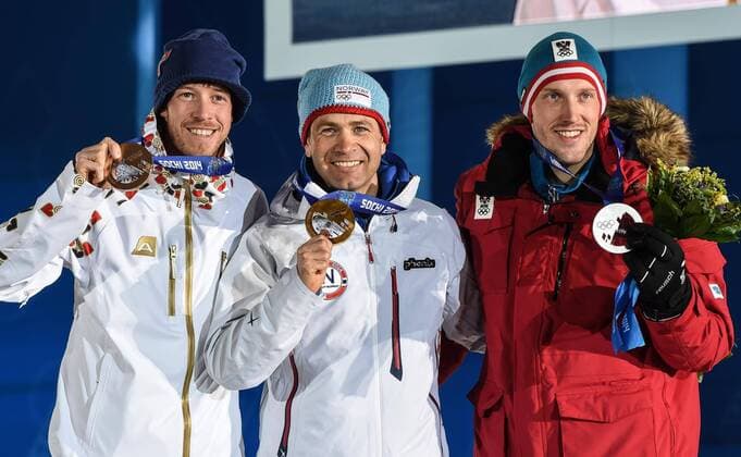 (140209) -- SOCHI, Feb. 9, 2014 (Xinhua) -- Gold medalist Ole Einar Björndalen (C) of Norway, silver medalist Dominik Landertinger (R) of Austria and bronze medalist Jaroslav Soukup of Czech Republic pose on the podium during the victory ceremony for the men s sprint 10 km of biathlon event at the Sochi 2014 Winter Olympic Games in Sochi, Feb. 9, 2014. (Xinhua Wang Haofei) (SP)OLY-RUSSIA-SOCHI-BIATHLON-MEN S SPRINT 10 KM-VICTORY CEREMONY 