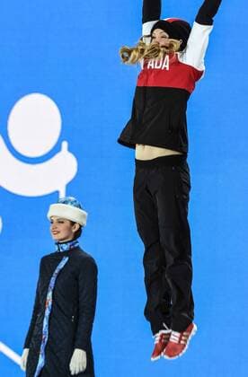 (140209) -- SOCHI, Feb. 9, 2014 (Xinhua) -- Gold medalist Justine Dufour-Lapointe of Canada celebrates at the victory-ceremony of Women s Moguls of Freestyle Skiing at the Sochi 2014 Winter Olympic Games in Sochi, Feb. 9, 2014. (Xinhua Wang Haofei) (SP)OLY-RUSSIA-SOCHI-FREESTYLE SKIING-WOMEN MOGULS-VICTORY CEREMONY 