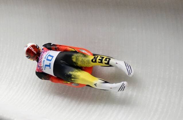Feb. 9, 2014 - Sochi, RUS - Germany s Felix Loch (10) slides to the gold medal in the fourth heat of the men s single luge competition at the Sanki Sliding Centre during the Winter Olympics in Sochi, Russia, Sunday, Feb. 9, 2014. Olympics Men s Single luge - ZUMAm67