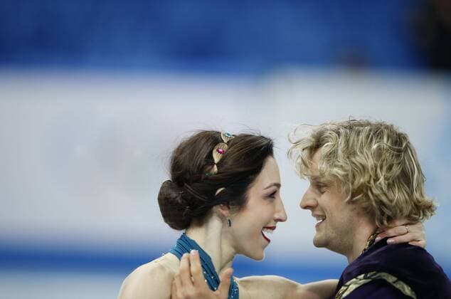 (140209) -- SOCHI, Feb. 9, 2014 (Xinhua) -- Meryl Davis (L) and Charlie White of the United States perform during the team ice dance free dance competition of figure skating event in the Sochi 2014 Winter Olympic Games in Sochi, Russia, Feb. 9, 2014. The United States ranked the third of the event. (Xinhua Wang Lili) (SP)OLY-RUSSIA-SOCHI-FIGURE SKATING-TEAM 