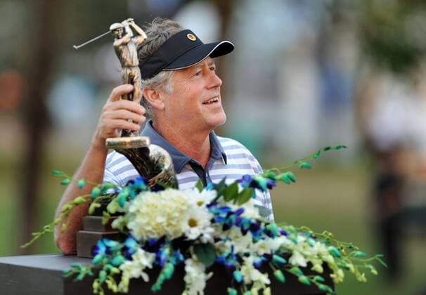 Feb. 9, 2014 - Boca Raton, FL, USA - Michael Allen hoists the trophy for winning the Allianz Championship at The Old Course at Broken Sound in Boca Raton, Fla., on Sunday, Feb. 9, 2014. SPORTS GLF-ALLIANZ - ZUMAm67