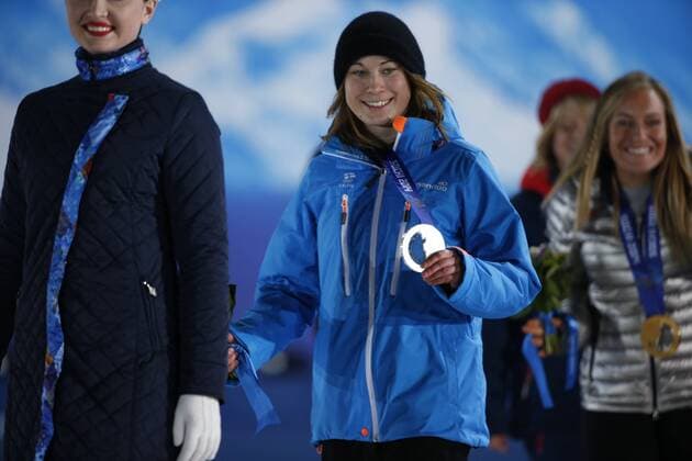 Feb. 9, 2014 - Sochi, Russian Federation - ENNI RUKAJARVI, 23, the Finnish snowboarder receiving the silver medal for Snowboard Ladies Slopestyle. Medal Ceremony was held in front of Olympic flame ion Olympic Park. Womens Snowboard Slopestyle - Sochi 2014 - ZUMAm30