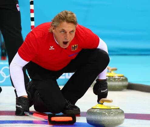 (140210) -- SOCHI, Feb. 10, 2014 (Xinhua) -- Germany s skip John Jahr gives instructions during the men s curling round robin session 1 against Canada at the 2014 Sochi Winter Olympic Games in Sochi, Russia, Feb. 10, 2014. Canada won 11-8. (Xinhua Gong Bing) (SP)OLY-RUSSIA-SOCHI-CURLING-MEN-CANADA VS GERMANY 