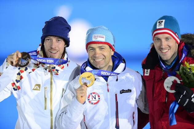 From left: third placed Czech biathlonist Jaroslav Soukup, winner Norway s Ole Einar Bjoerndalen and second placed Austria s Dominik Landertinger pose with their medals after the men s biathlon 10k sprint at the 2014 Winter Olympics, February 9, 2014, in Sochi, Russia. (CTKxPhoto RomanxVondrous) CTKPhotoP201402090712601  VND