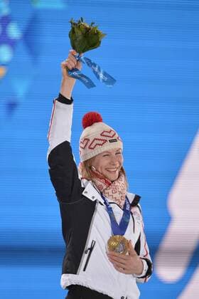 Slovokia s Anastasiya Kuzmina holds her gold medal win during the victory ceremony for the Biathalon Women s Sprint at the Sochi 2014 Winter Olympics on February 10, 2014 in Sochi, Russia.  OLY20140210132