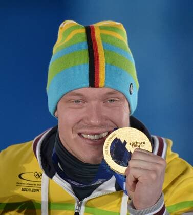 Germany s Felix Loch holds his gold medal during the victory ceremony for men s luge singles at the Sochi 2014 Winter Olympics on February 10, 2014 in Sochi, Russia.  OLY20140210152