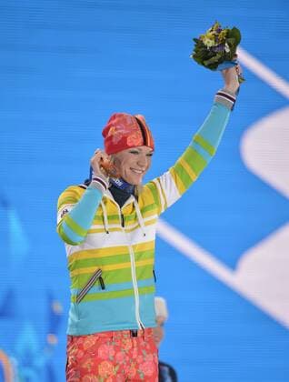 Germany s Maria HÖFL RIESCH holds her gold medal during the victory ceremony for alpine ladies super combined at the Sochi 2014 Winter Olympics on February 10, 2014 in Sochi, Russia.  OLY20140210180