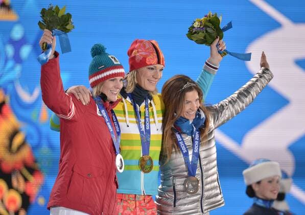 Austria s Nicole Hosp (L-R), Germany s Maria HÖFL RIESCH and United States Julia Mancuso stand with their silver, gold and bronze medals during the victory ceremony for alpine ladies super combined at the Sochi 2014 Winter Olympics on February 10, 2014 in Sochi, Russia.  OLY20140210183