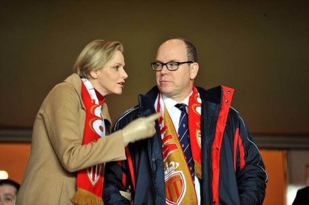 Princes Charlene of Monaco and Prince Albert of Monaco get ready to watch the match - AS Monaco v Paris-Saint-Germain (PSG) - Ligue 1 EDITORIAL USE ONLY. No use with unauthorised audio, video, data, fixture lists, club league logos or live services. Online in-match use limited to 120 images, no video emulation. No use in betting, games or single club league player publications.