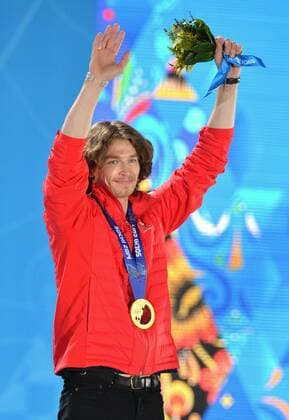 Gold medalist, Switzerland s Louri Podladtchikov, celebrates during the victory ceremony for men s snowboard halfpipe, at the Sochi 2014 Winter Olympics on February 12, 2014 in Sochi, Russia.  OLY20140212355