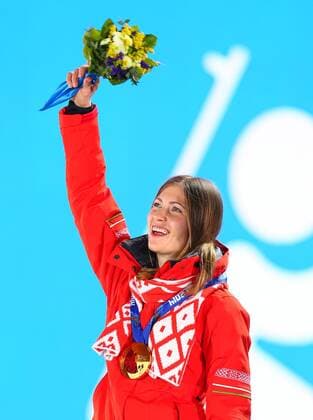 (140212) -- SOCHI, Feb. 12, 2014 (Xinhua) -- Gold medalist Darya Domracheva of Belarus poses on the podium during the victory ceremony for the women s 10km pursuit of biathlon event at the 2014 Sochi Winter Olympic Games in Sochi, Russia, Feb. 12, 2014. (Xinhua Gong Bing) (SP)OLY-RUSSIA-SOCHI-BIATHLON-WOMEN S 10KM PURSUIT 
