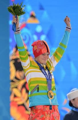 Gold medalist Germany s Carina Vogt celebrates during the victory ceremony for the ski jumping ladies normal hill individual at the Sochi 2014 Winter Olympics on February 12, 2014 in Sochi, Russia.  OLY20140212382