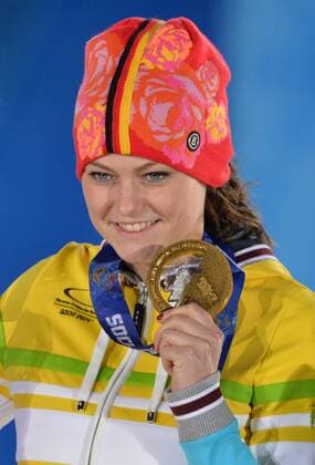 Gold medalist Germany s Carina Vogt poses with her medal during the victory ceremony for the ski jumping ladies normal hill individual at the Sochi 2014 Winter Olympics on February 12, 2014 in Sochi, Russia.  OLY20140212381