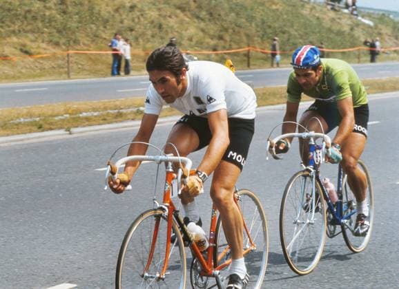Road Cycling - 1974 Tour de France - Stage Two: Plymouth-Plymouth Belgium s Eddy Merckx, in the white combination jersey, on the Plympton bypass. He would go on to win the general classification. It was the first time the Tour had been staged on British soil, to celebrate the UK s entry to the Common Market 29 07 1974 