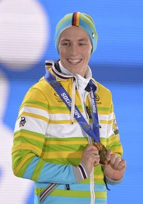 Germany s Eric Frenzel celebrates with his gold during the victory ceremony for 10km nordic combined individual Gunderson NH at the Sochi 2014 Winter Olympics on February 13, 2014 in Sochi, Russia.  OLY20140213404