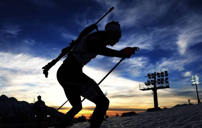 OLYMPIA - Olympische Spiele 2014 KRASNAJA POLJANA,RUSSLAND,13.FEB.14 - DIVERS, OLYMPIA, BIATHLON - Olympische Winterspiele Sotschi 2014, Laura Center, Khrebet Psekhako, 20km Einzel der Herren. Bild zeigt Simon Eder (AUT). Keywords: ÖBH. 