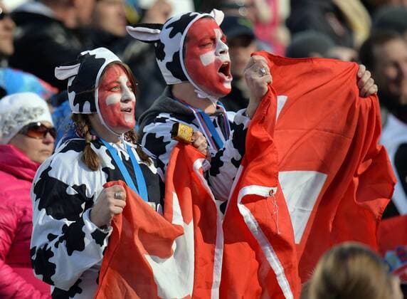 Switzerland fans cheer on their team during the men s super combined at the Sochi 2014 Winter Olympics on February 14, 2014 in Krasnaya Polyana, Russia.  OLY20140214331