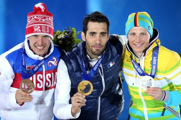 OLYMPIA - Olympische Spiele 2014 SOTSCHI,RUSSLAND,14.FEB.14 - DIVERS, OLYMPIA, BIATHLON- Olympische Winterspiele Sotschi 2014, Siegerehrung, Medaillenvergabe am Medal Plaza, 20km Einzel der Herren. Bild zeigt Evgeniy Garanichev (RUS), Martin Fourcade (FRA) und Erik Lesser (GER). Keywords: Medaille. 