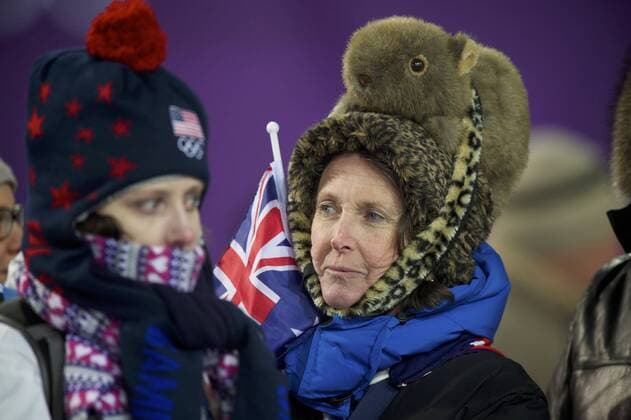 Feb. 14, 2014 - Sochi, Russia - Fans at the Ladies Aerials wear unusual hats to stay warm at the 2014 Winter Olympics in Sochi. Ladies Aerials - Sochi 2014 - ZUMAw10