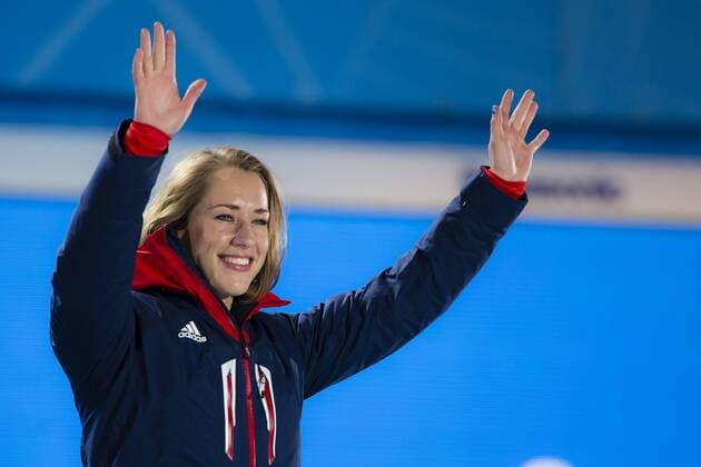 15.02.2014 Sochi, Krasnodar Krai, Russia. A tearful Lizzy YARNOLD (GBR) climbs onto the top step of the podium to receive her Gold medal during the Medal Ceremony for the Women s Skeleton at the Sochi Medals Plaza, Coastal Cluster - XXII Olympic Winter Games xCraigxMercerx  ActionPlus20172923