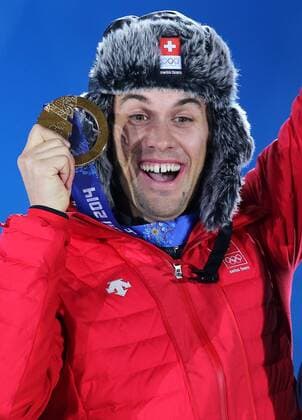 OLYMPIA - Olympische Spiele 2014 SOTSCHI,RUSSLAND,15.FEB.14 - DIVERS, OLYMPIA, SKI ALPIN - Olympische Winterspiele Sotschi 2014, Superkombination der Herren, Siegerehrung, Medaillenvergabe am Medal Plaza. Bild zeigt den Jubel von Sandro Viletta (SUI). Keywords: Medaillie. 