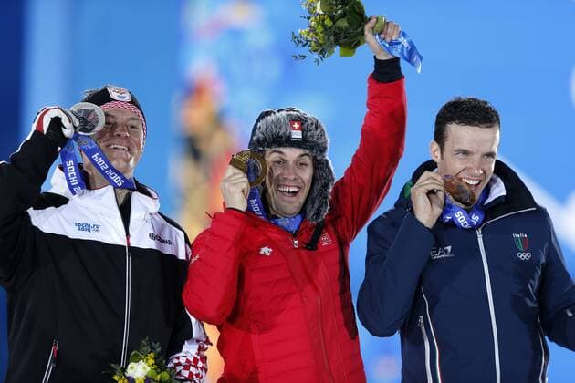 (140215) -- SOCHI, Feb. 15, 2014 (Xinhua) -- Gold medalist Sandro Viletta of Switzerland (C) poses with silver medalist Ivica Kostelic of Croatia (L) and Christof Innerhofer of Italy during the awarding ceremony for the men s super combined of alpine skiing at the 2014 Sochi Winter Olympic Games in Sochi, Russia, Feb. 15, 2014. (Xinhua Wang Lili) (SP)OLY-RUSSIA-SOCHI-ALPINE SKIING-MEN S SUPER COMBINED 