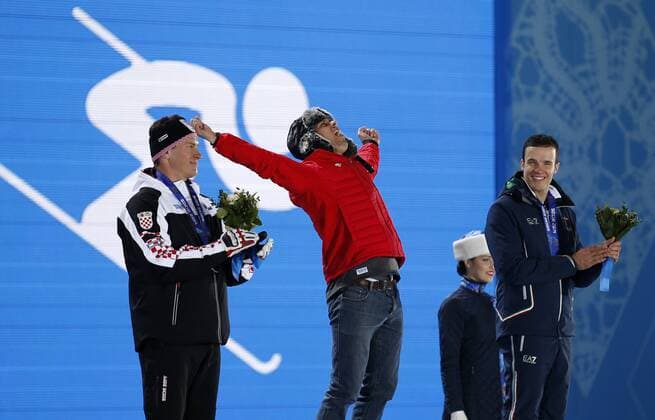 (140215) -- SOCHI, Feb. 15, 2014 (Xinhua) -- Gold medalist Sandro Viletta of Switzerland (2nd L) celebrates during the awarding ceremony for the men s super combined of alpine skiing at the 2014 Sochi Winter Olympic Games in Sochi, Russia, Feb. 15, 2014. (Xinhua Wang Lili) (SP)OLY-RUSSIA-SOCHI-ALPINE SKIING-MEN S SUPER COMBINED 