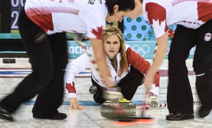 (140216) -- SOCHI, Feb. 16, 2014 (Xinhua) -- Canada s Jennifer Jones competes during the women s round robin session 10 of curling event against Canada at the 2014 Sochi Winter Olympic Games in Sochi, Russia, Feb. 16, 2014. The US lost 6-7. (Xinhua Wang Haofei) (SP)OLY-RUSSIA-SOCHI-CURLING-USA VS CAN 